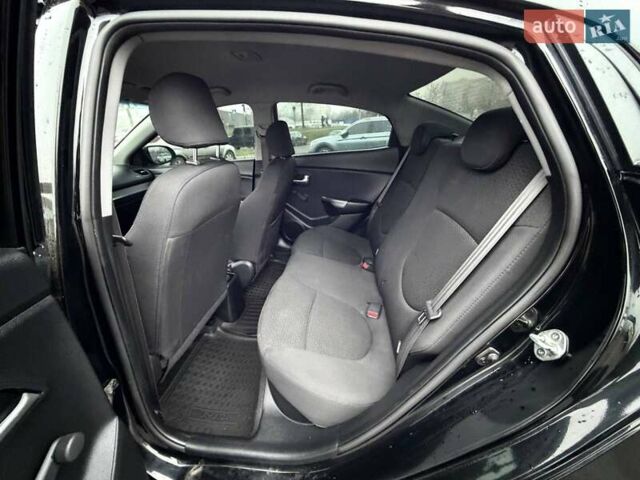Черный Киа Рио, объемом двигателя 1.4 л и пробегом 220 тыс. км за 8200 $, фото 28 на Automoto.ua