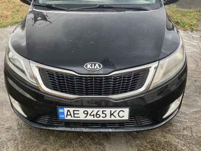 Чорний Кіа Ріо, об'ємом двигуна 1.4 л та пробігом 88 тис. км за 8300 $, фото 1 на Automoto.ua