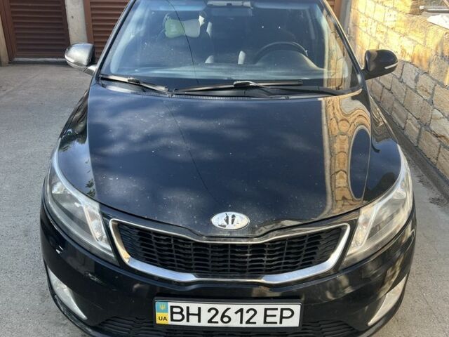 Чорний Кіа Ріо, об'ємом двигуна 1.6 л та пробігом 128 тис. км за 8500 $, фото 1 на Automoto.ua