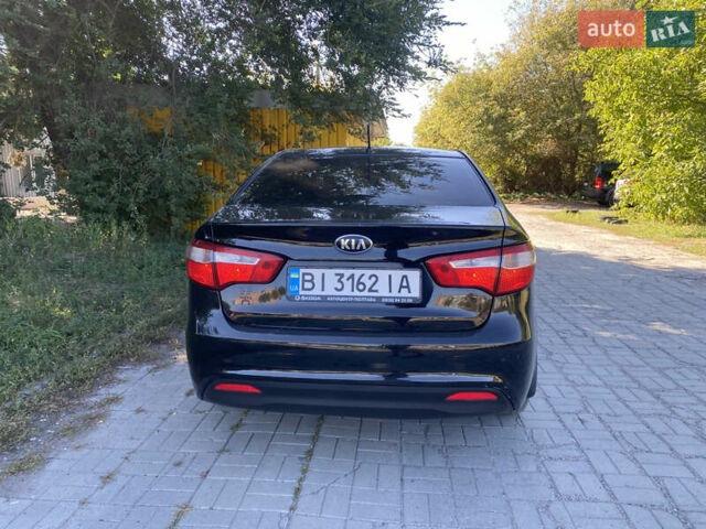 Черный Киа Рио, объемом двигателя 1.59 л и пробегом 194 тыс. км за 6700 $, фото 4 на Automoto.ua