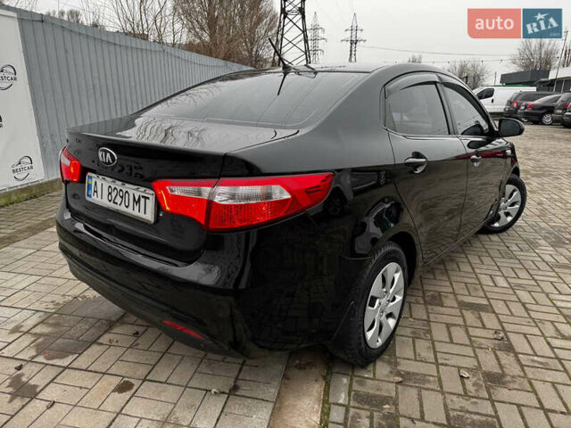 Черный Киа Рио, объемом двигателя 1.4 л и пробегом 185 тыс. км за 6999 $, фото 3 на Automoto.ua