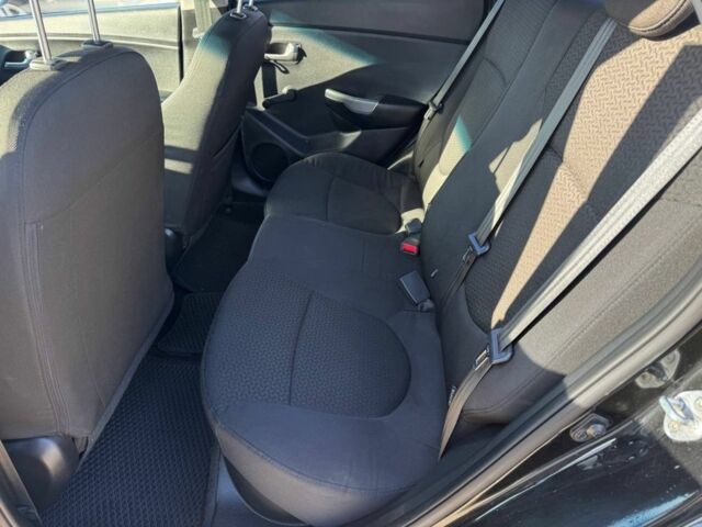 Чорний Кіа Ріо, об'ємом двигуна 1.4 л та пробігом 214 тис. км за 7700 $, фото 13 на Automoto.ua