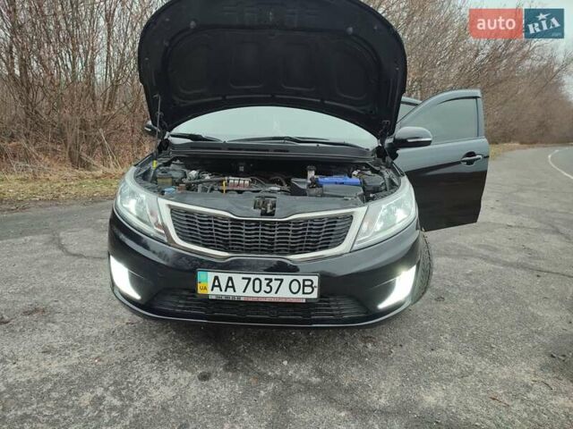 Чорний Кіа Ріо, об'ємом двигуна 1.59 л та пробігом 87 тис. км за 9499 $, фото 36 на Automoto.ua