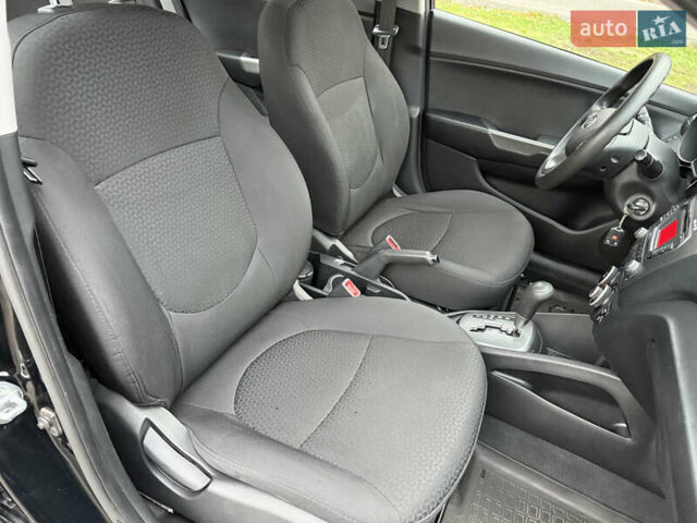 Чорний Кіа Ріо, об'ємом двигуна 1.4 л та пробігом 45 тис. км за 9800 $, фото 22 на Automoto.ua