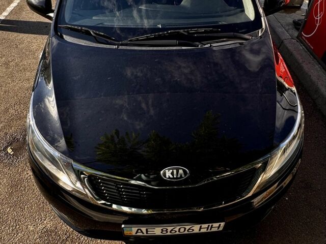Чорний Кіа Ріо, об'ємом двигуна 1.4 л та пробігом 73 тис. км за 9000 $, фото 6 на Automoto.ua