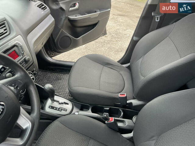 Черный Киа Рио, объемом двигателя 1.4 л и пробегом 136 тыс. км за 7700 $, фото 25 на Automoto.ua