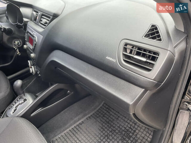 Черный Киа Рио, объемом двигателя 1.4 л и пробегом 136 тыс. км за 7700 $, фото 37 на Automoto.ua