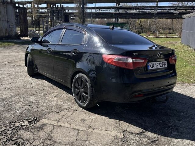 Чорний Кіа Ріо, об'ємом двигуна 1.6 л та пробігом 329 тис. км за 6000 $, фото 5 на Automoto.ua