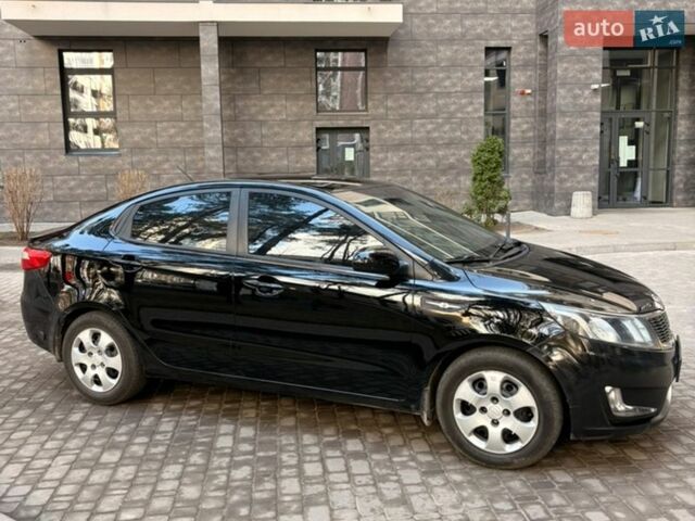 Чорний Кіа Ріо, об'ємом двигуна 1.6 л та пробігом 272 тис. км за 5950 $, фото 5 на Automoto.ua