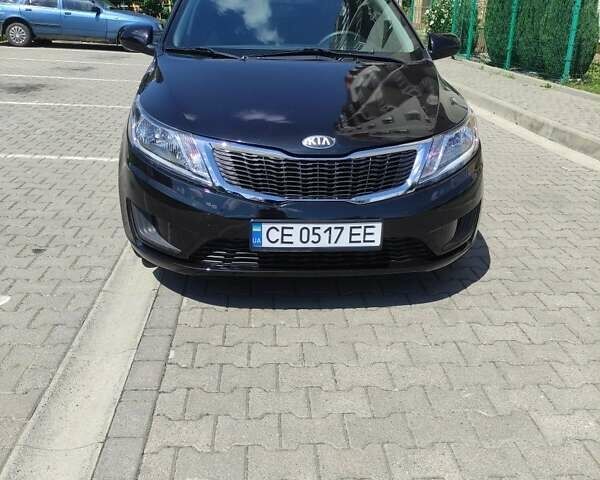 Чорний Кіа Ріо, об'ємом двигуна 1.4 л та пробігом 186 тис. км за 6800 $, фото 3 на Automoto.ua