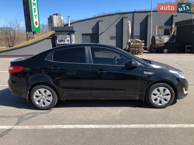 Чорний Кіа Ріо, об'ємом двигуна 1.4 л та пробігом 177 тис. км за 6800 $, фото 5 на Automoto.ua