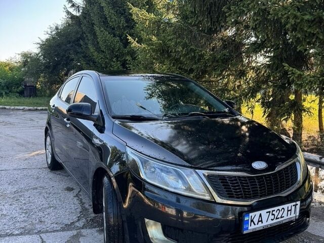 Чорний Кіа Ріо, об'ємом двигуна 1.4 л та пробігом 179 тис. км за 8000 $, фото 2 на Automoto.ua