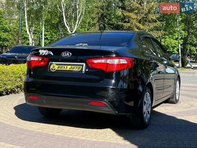 Черный Киа Рио, объемом двигателя 1.4 л и пробегом 215 тыс. км за 6999 $, фото 6 на Automoto.ua