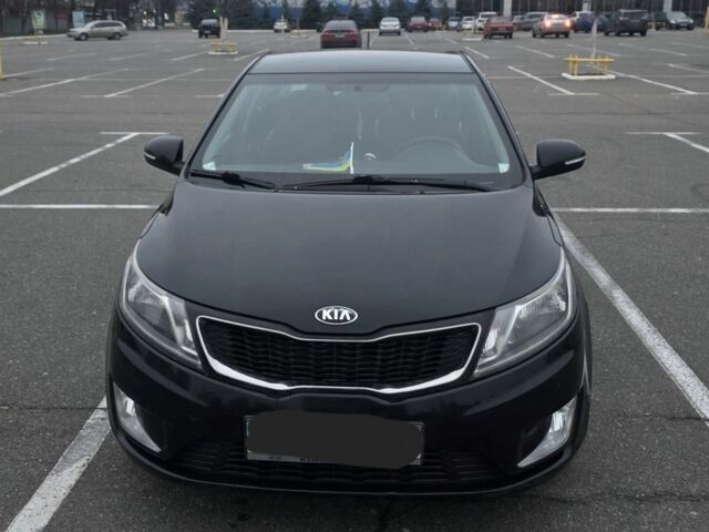 Черный Киа Рио, объемом двигателя 1.6 л и пробегом 150 тыс. км за 9000 $, фото 1 на Automoto.ua