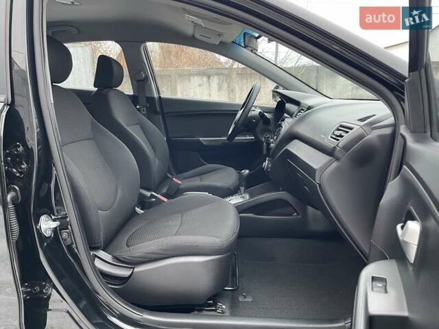 Черный Киа Рио, объемом двигателя 1.4 л и пробегом 124 тыс. км за 9350 $, фото 108 на Automoto.ua