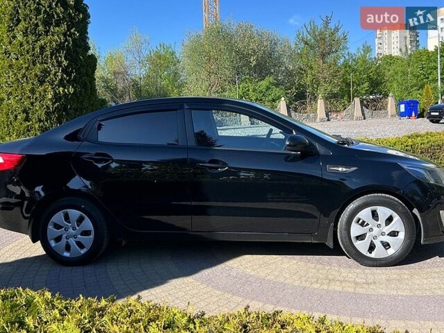 Черный Киа Рио, объемом двигателя 1.4 л и пробегом 215 тыс. км за 6999 $, фото 7 на Automoto.ua