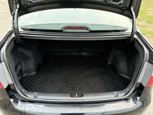 Чорний Кіа Ріо, об'ємом двигуна 1.4 л та пробігом 45 тис. км за 9800 $, фото 23 на Automoto.ua