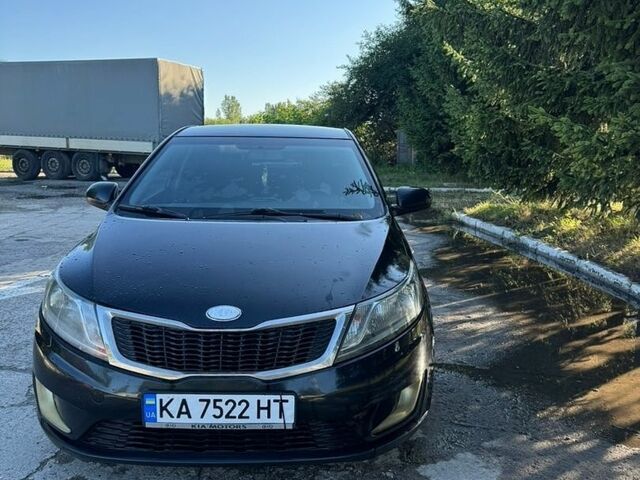 Чорний Кіа Ріо, об'ємом двигуна 1.4 л та пробігом 179 тис. км за 8000 $, фото 6 на Automoto.ua