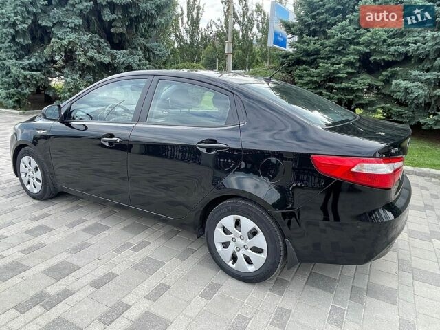 Черный Киа Рио, объемом двигателя 1.4 л и пробегом 89 тыс. км за 8300 $, фото 2 на Automoto.ua