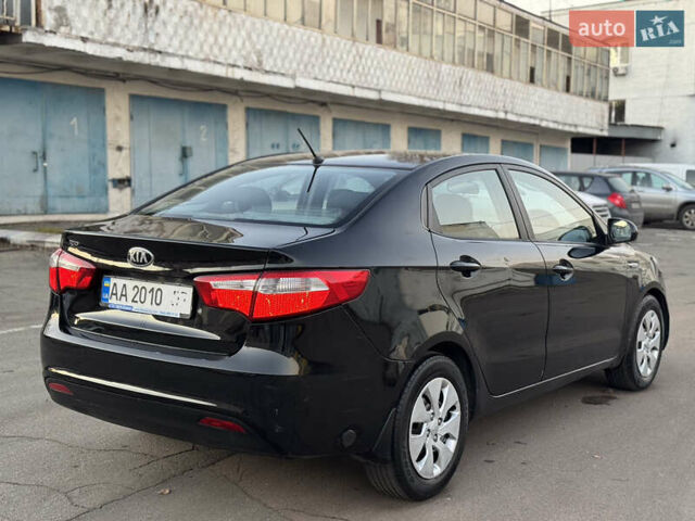 Черный Киа Рио, объемом двигателя 1.4 л и пробегом 305 тыс. км за 4950 $, фото 6 на Automoto.ua