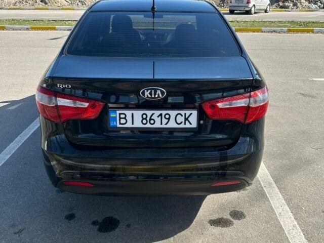 Черный Киа Рио, объемом двигателя 1.4 л и пробегом 139 тыс. км за 9500 $, фото 2 на Automoto.ua