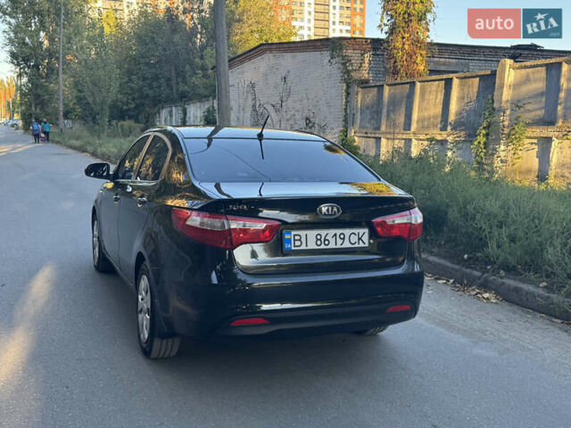 Черный Киа Рио, объемом двигателя 1.4 л и пробегом 135 тыс. км за 8000 $, фото 7 на Automoto.ua