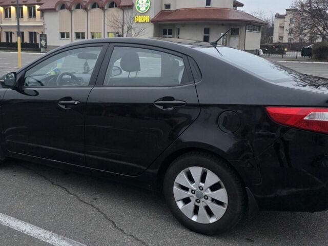 Черный Киа Рио, объемом двигателя 1.6 л и пробегом 150 тыс. км за 9000 $, фото 5 на Automoto.ua