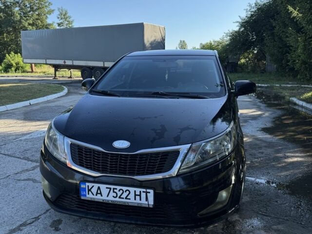 Черный Киа Рио, объемом двигателя 1.4 л и пробегом 179 тыс. км за 7998 $, фото 1 на Automoto.ua