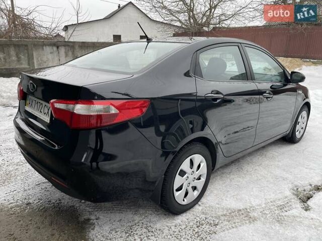 Черный Киа Рио, объемом двигателя 1.4 л и пробегом 124 тыс. км за 9350 $, фото 51 на Automoto.ua