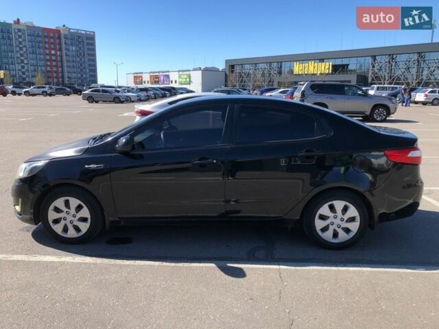 Чорний Кіа Ріо, об'ємом двигуна 1.4 л та пробігом 177 тис. км за 6800 $, фото 6 на Automoto.ua