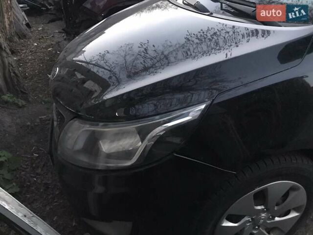 Чорний Кіа Ріо, об'ємом двигуна 1.4 л та пробігом 102 тис. км за 2350 $, фото 4 на Automoto.ua