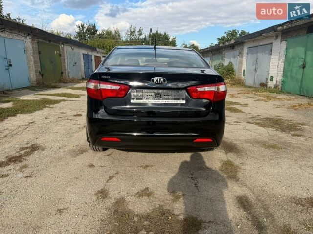 Черный Киа Рио, объемом двигателя 1.6 л и пробегом 61 тыс. км за 10300 $, фото 7 на Automoto.ua