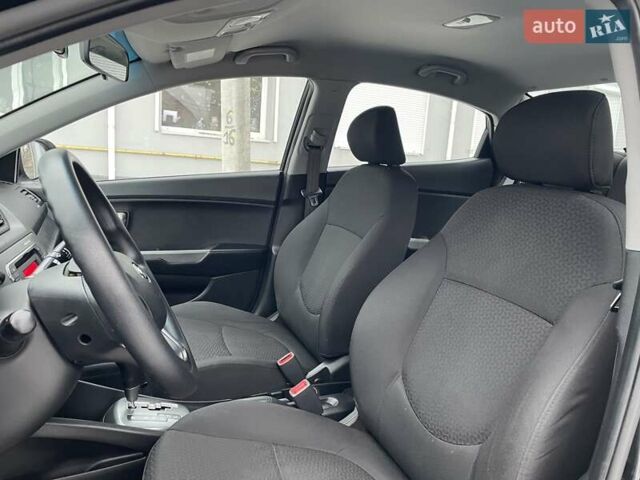 Черный Киа Рио, объемом двигателя 1.4 л и пробегом 124 тыс. км за 9350 $, фото 99 на Automoto.ua
