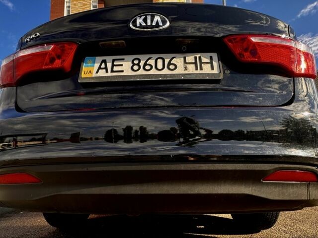 Чорний Кіа Ріо, об'ємом двигуна 1.4 л та пробігом 73 тис. км за 9000 $, фото 7 на Automoto.ua
