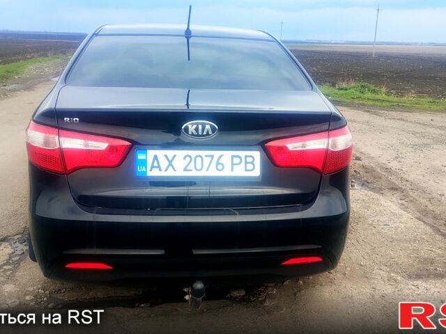 Чорний Кіа Ріо, об'ємом двигуна 1.6 л та пробігом 91 тис. км за 7800 $, фото 2 на Automoto.ua