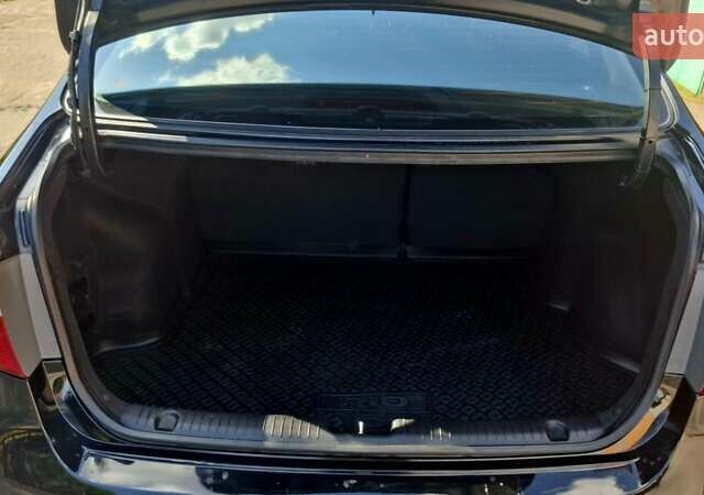 Черный Киа Рио, объемом двигателя 1.6 л и пробегом 130 тыс. км за 8750 $, фото 21 на Automoto.ua