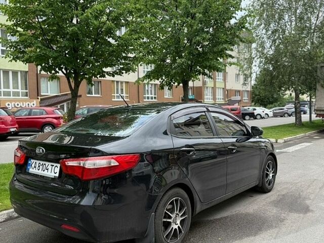 Черный Киа Рио, объемом двигателя 1.4 л и пробегом 128 тыс. км за 9200 $, фото 5 на Automoto.ua