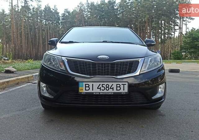Черный Киа Рио, объемом двигателя 1.59 л и пробегом 150 тыс. км за 8300 $, фото 6 на Automoto.ua