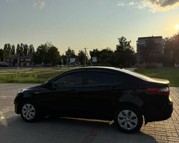 Черный Киа Рио, объемом двигателя 1.4 л и пробегом 183 тыс. км за 7000 $, фото 6 на Automoto.ua