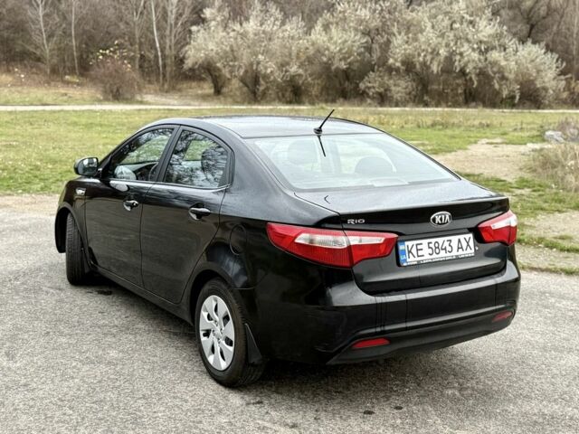 Чорний Кіа Ріо, об'ємом двигуна 1.4 л та пробігом 45 тис. км за 9800 $, фото 6 на Automoto.ua
