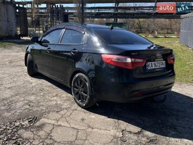 Чорний Кіа Ріо, об'ємом двигуна 1.59 л та пробігом 329 тис. км за 6000 $, фото 5 на Automoto.ua