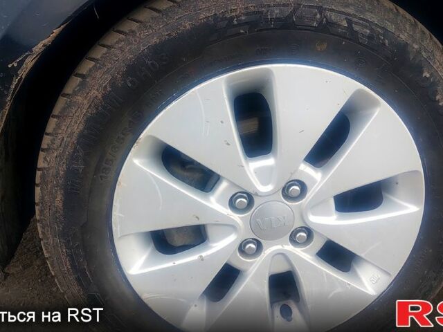 Чорний Кіа Ріо, об'ємом двигуна 1.6 л та пробігом 91 тис. км за 7800 $, фото 4 на Automoto.ua