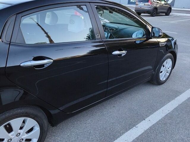 Чорний Кіа Ріо, об'ємом двигуна 1.59 л та пробігом 99 тис. км за 8800 $, фото 8 на Automoto.ua