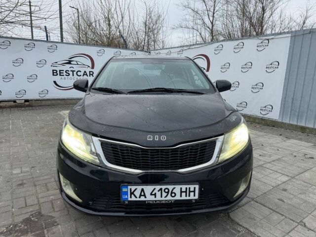 Чорний Кіа Ріо, об'ємом двигуна 1.4 л та пробігом 214 тис. км за 7700 $, фото 4 на Automoto.ua