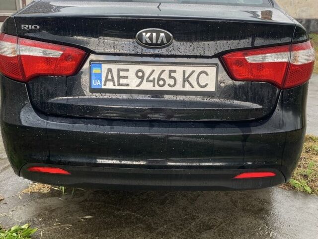 Чорний Кіа Ріо, об'ємом двигуна 1.4 л та пробігом 88 тис. км за 8300 $, фото 2 на Automoto.ua
