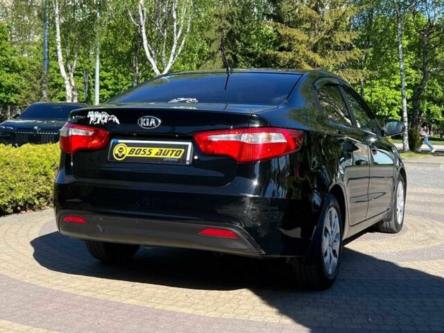 Черный Киа Рио, объемом двигателя 1.4 л и пробегом 215 тыс. км за 6999 $, фото 6 на Automoto.ua