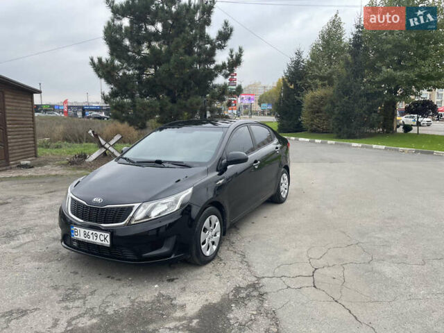 Черный Киа Рио, объемом двигателя 1.4 л и пробегом 136 тыс. км за 7700 $, фото 2 на Automoto.ua