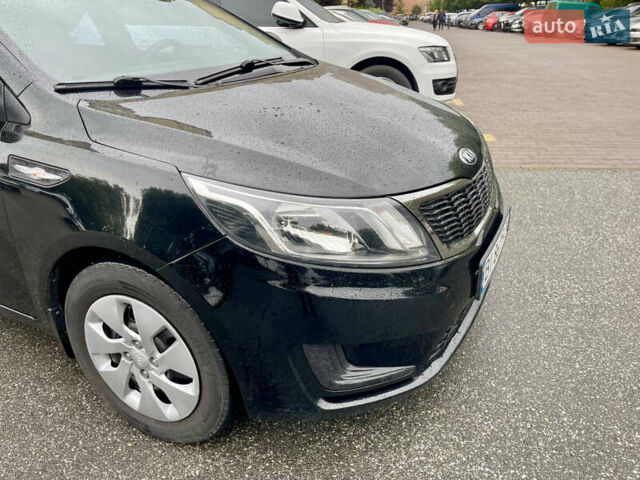 Чорний Кіа Ріо, об'ємом двигуна 1.4 л та пробігом 136 тис. км за 7950 $, фото 17 на Automoto.ua
