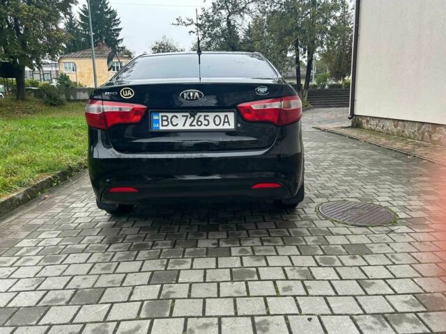 Черный Киа Рио, объемом двигателя 1.4 л и пробегом 141 тыс. км за 7200 $, фото 6 на Automoto.ua