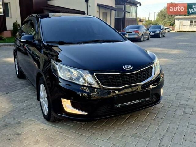 Черный Киа Рио, объемом двигателя 1.6 л и пробегом 130 тыс. км за 8750 $, фото 38 на Automoto.ua